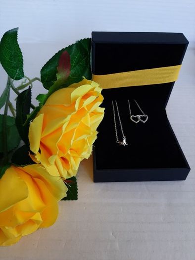 new silver hearts pendant with real diamonds