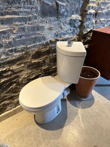 Brand new never used corner toilet