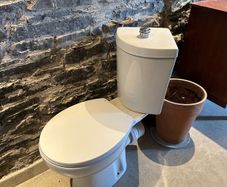 Brand new never used corner toilet