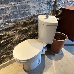 Brand new never used corner toilet