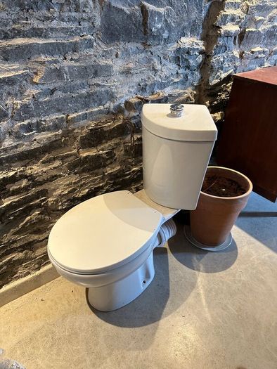 Brand new never used corner toilet