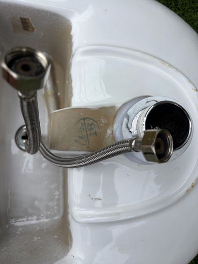 Sink with pedestal and tap
