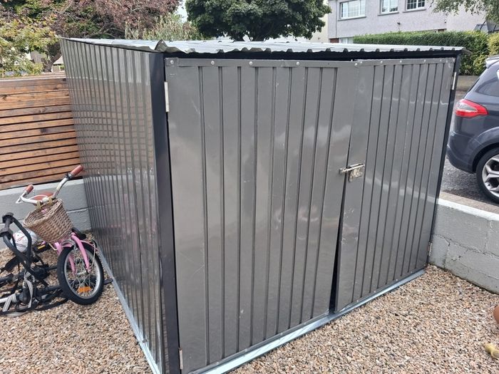 Metal Shed, 1 year old. Damaged by wind, for repair or scrap only