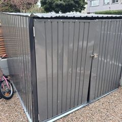 Metal Shed, 1 year old. Damaged by wind, for repair or scrap only