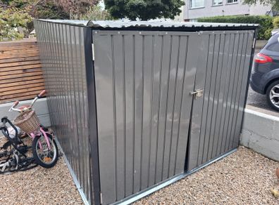 Metal Shed, 1 year old. Damaged by wind, for repair or scrap only