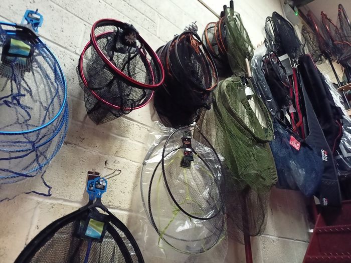 Fishing bait rods lines reels waders lures feeds jackets rod holders and other fishing gear