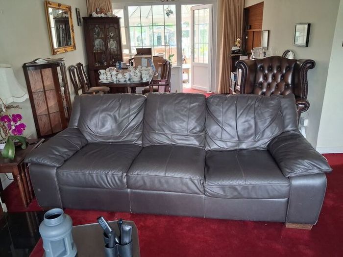 3 seater Black Brown Leather. Marks on back (but if against a wall, it doesnt matter!!)