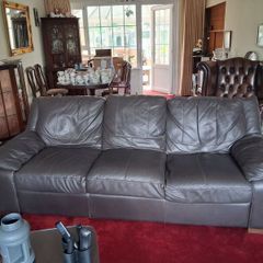 3 seater Black Brown Leather. Marks on back (but if against a wall, it doesnt matter!!)