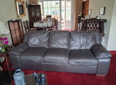 3 seater Black Brown Leather. Marks on back (but if against a wall, it doesnt matter!!)