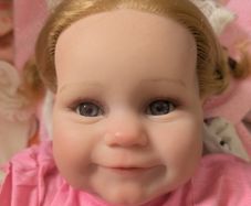 Lifelike baby girl reborn doll.