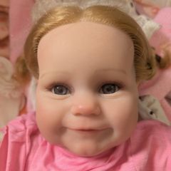 Lifelike baby girl reborn doll.