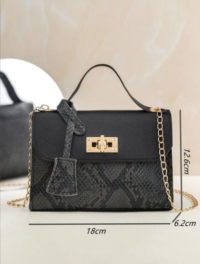 Black snakeskin twist lock bag