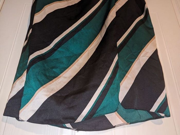 Perfect for Summer. Stunning wrap effect multi colour midi skirt