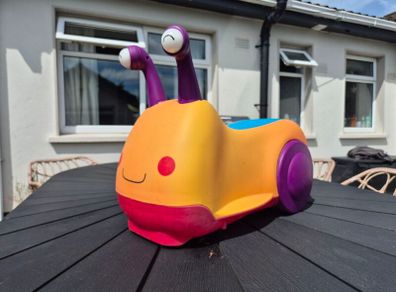 ride on snails b. Toys