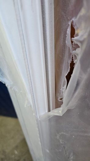 White primed door ,missing glass panel