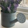 Faux plant in a watering can Image 2