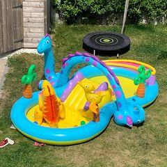 Dinosaur paddling pool with slide