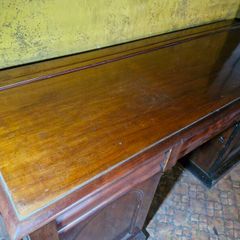 Georgian or Regency period mahogany side board with wine racks