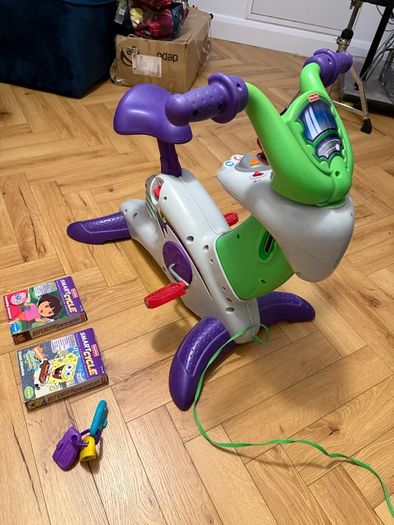 Kids bicycle-game console Fisherprice smart cycle with 3 cartridges