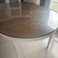 Dining table with glass top