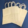 Small white paper bags Image 5