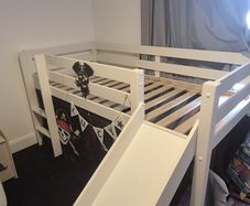 Mid sleeper bed with slide
