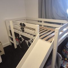 Mid sleeper bed with slide