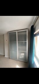 IKEA PAX sliding wardrobe with frosted sliding doors