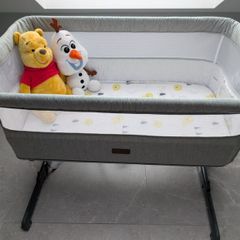 Nested bedside crib
