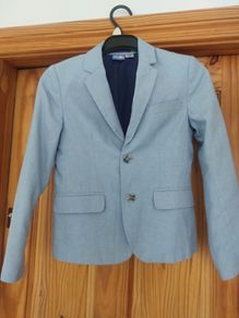 Light blue boys jacket. 128cm 8/9years old