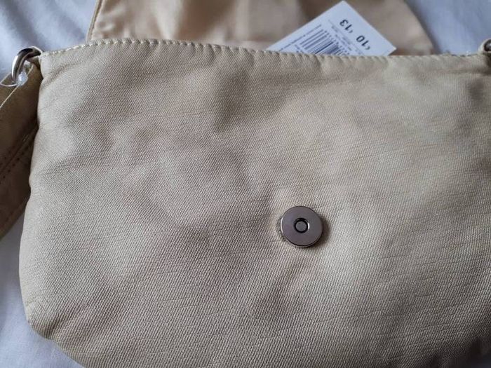New cross over bag tag attached