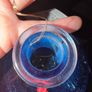 Blue gunpowder gin bottle with cork string lights Image 4