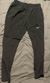 Nike Dri-FIT UV Challenger Men s Woven Hybrid Running Pants Nike Bottoms running pants size large brand new with tag Tracksuit pants bottoms