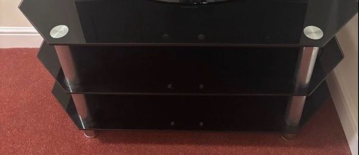 tv stand black glass and chrome  3 glass shelves.42 inches in height and 20 inches in length