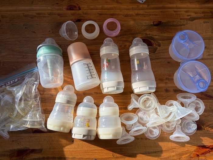 Baby bottles, teats and formula dispensers