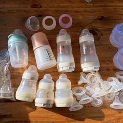 Baby bottles, teats and formula dispensers