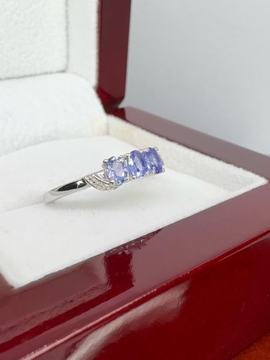 Silver Tanzanite Trilogy Ring in Platinum Overlay Sterling Silver.