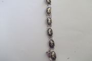 a vintage silver and enamel bracelet