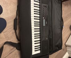 Yamaha PSR E383 with seat cover and stand