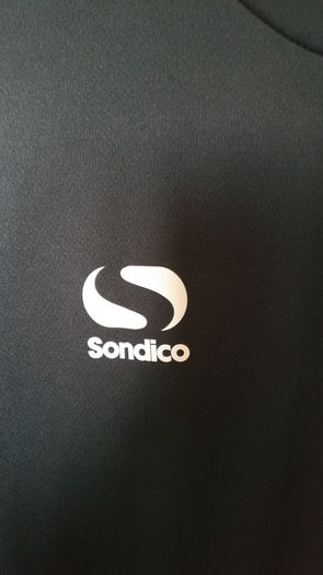 Black jersey, size M, new but no tags