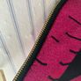 New Skinny Dip magenta glitter lip clutch (read in full) Image 3
