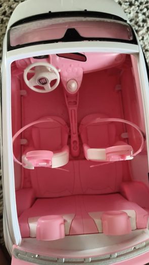 Barbie with car.