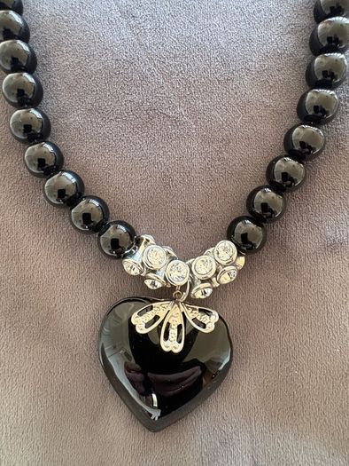 Black necklace with large black heart pendant