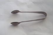 a antique solid silver suger tongs or nips
