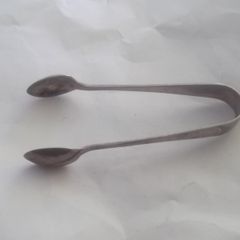 a antique solid silver suger tongs or nips