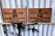 Matching pair of wooden wine plaques