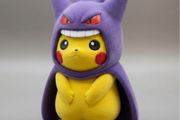 Pikachu wearing Gengar's iconic poncho