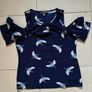 Open shoulder loose bird top Image 2