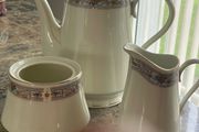 Bud let teapot milk and sugar