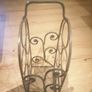 Handcrafted Wine bottles stand polished cast iron Image 3